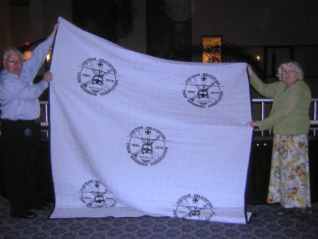 (153) Still another big raffle item was a VHCMA quilt... won by our own Don and Jean Smith..